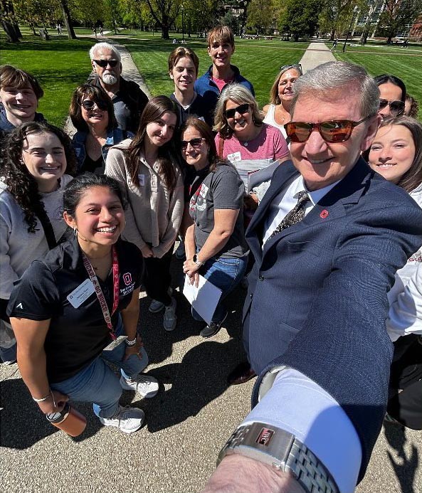 President Walter 'Ted' Carter Jr. joins a campus tour for a selfie